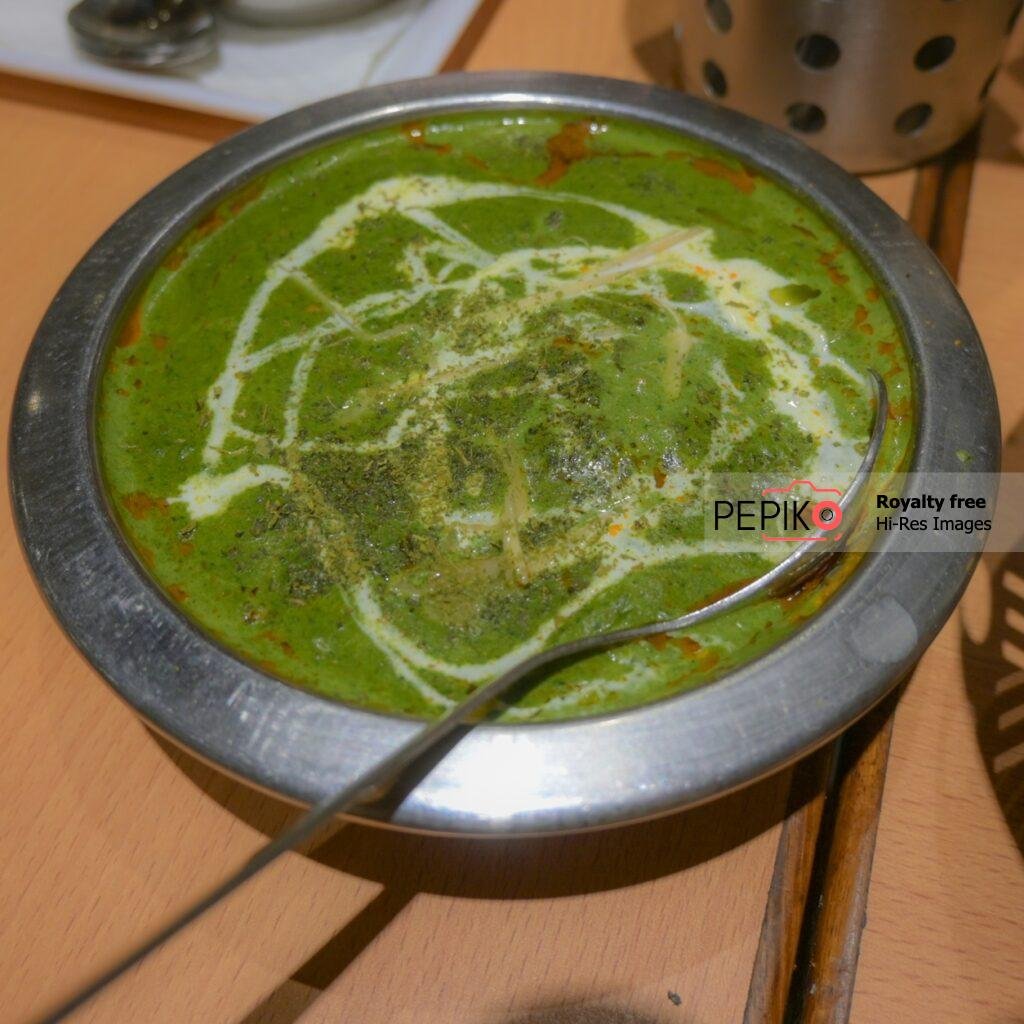 Rich spinach vegetables made with Indian species.