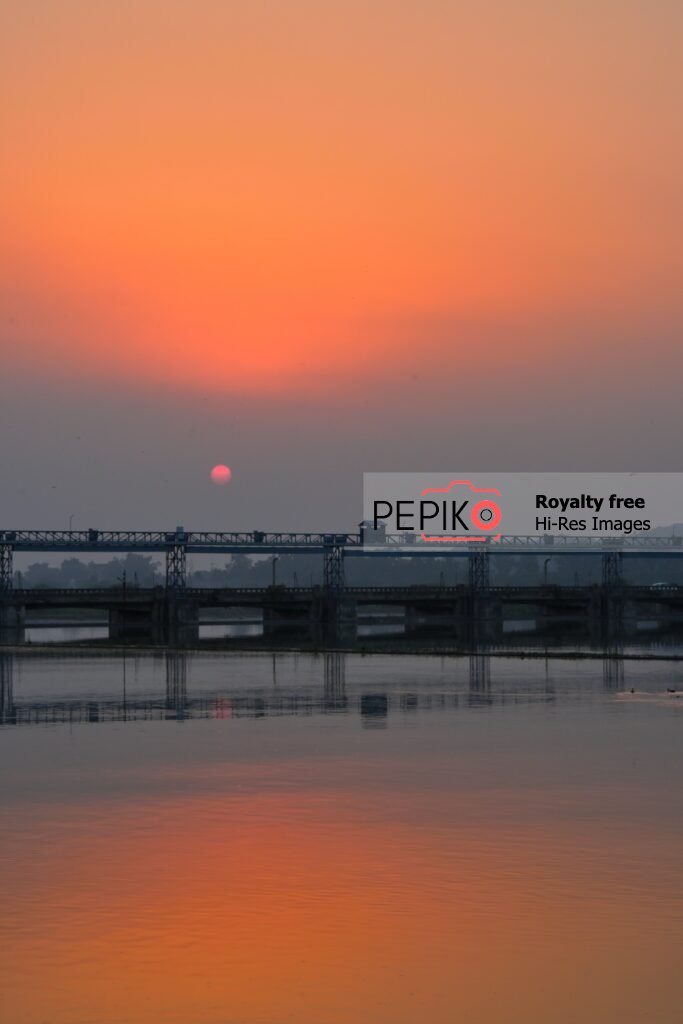 
									Beautiful sunset view of water lake in India (Vertical)