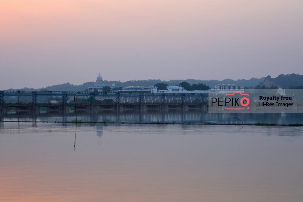 
									Scenic view of water dam with green trees at evening time in water dam Punjab India