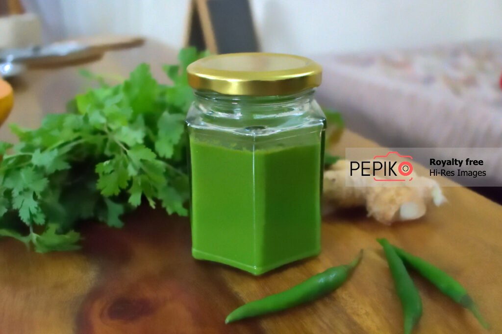 
									One more Picture of Green mint and chili chutney in glass jar