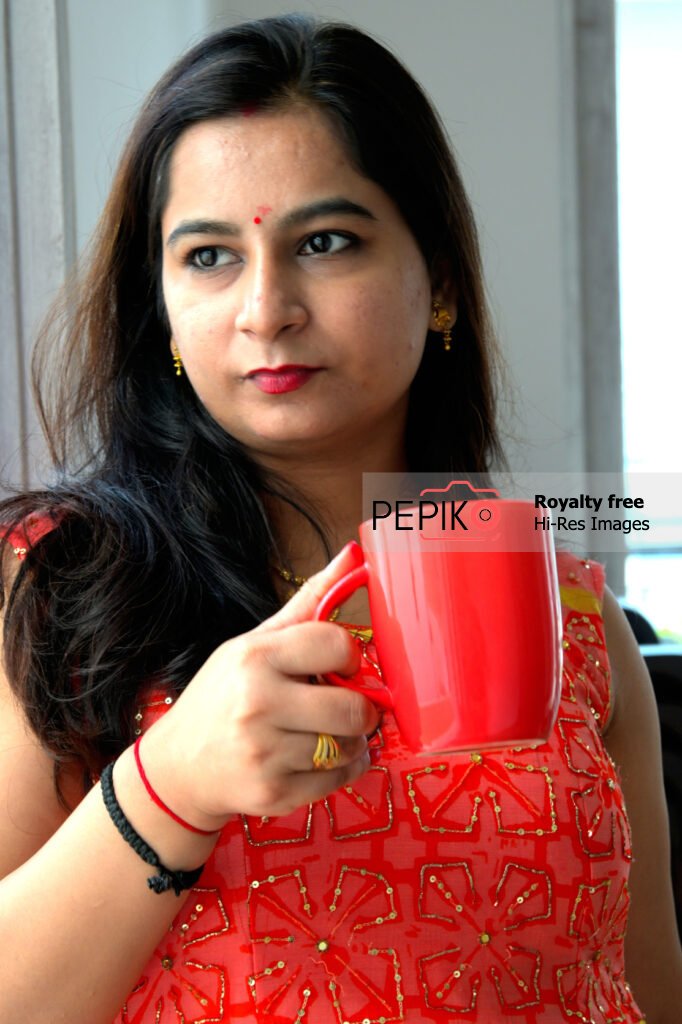 Model posing for cup brand – pose 5