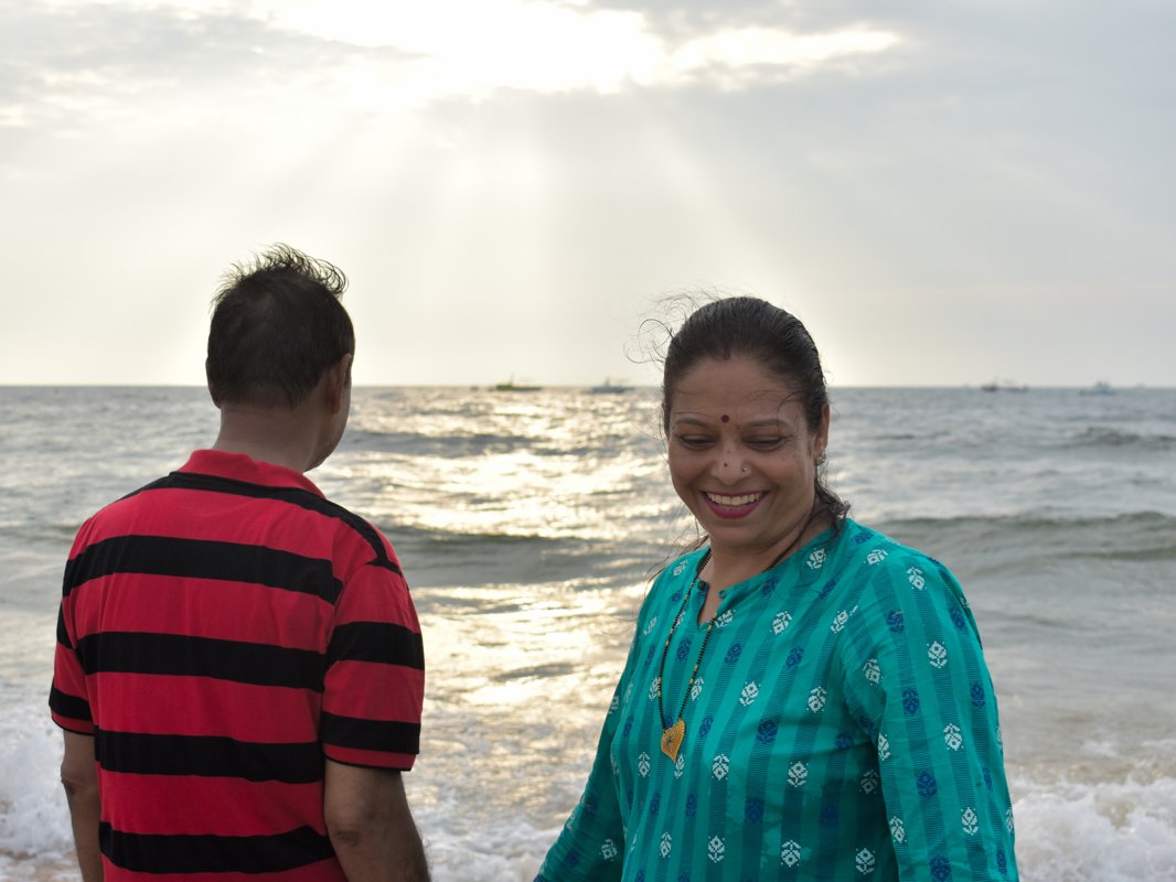 Mature wife and husband enjoying at beach