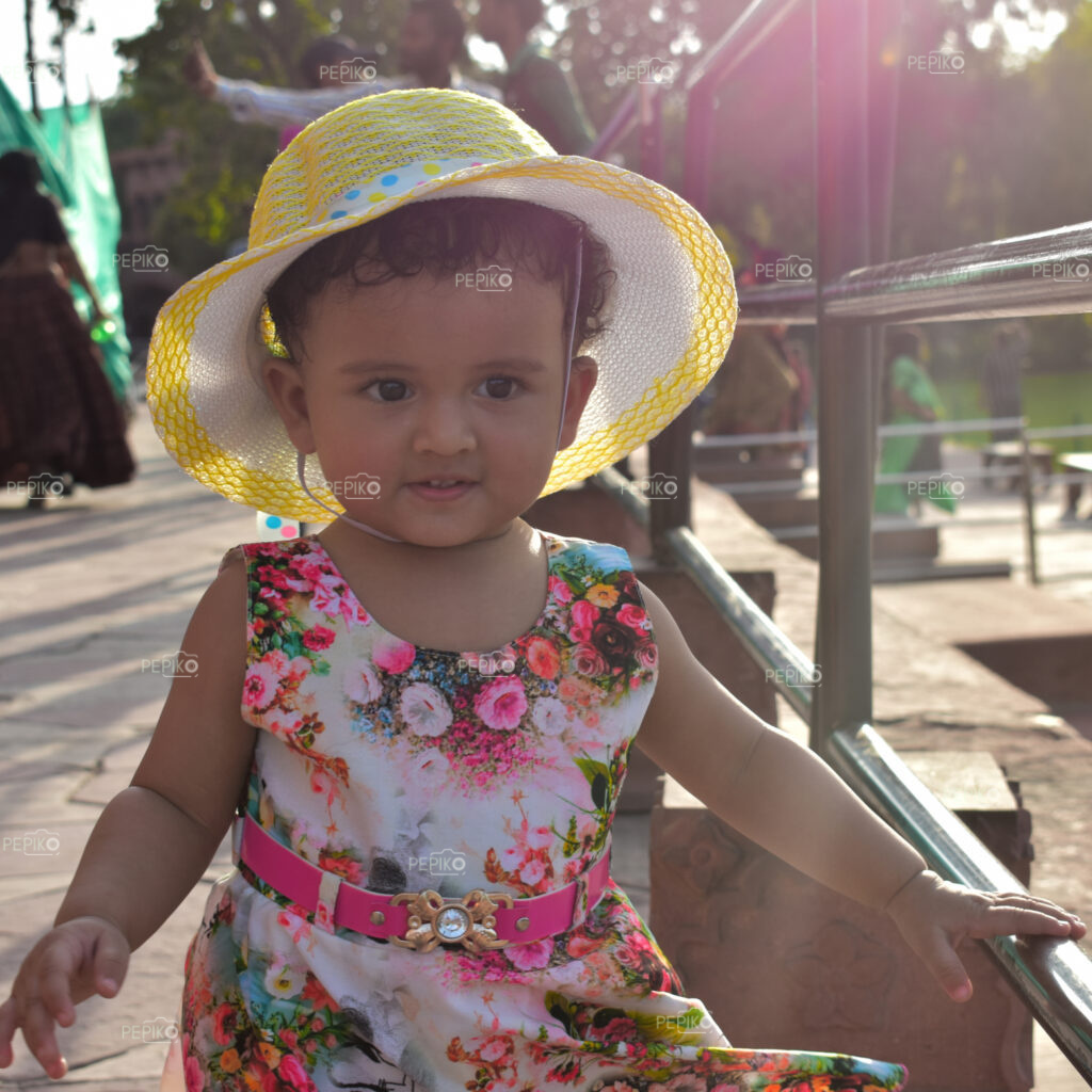 Portrait of child in pink clothes