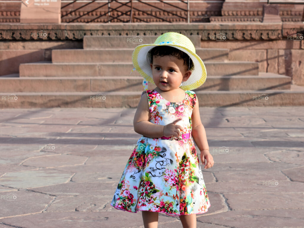 
									Picture of little girl in vibrant pink dress