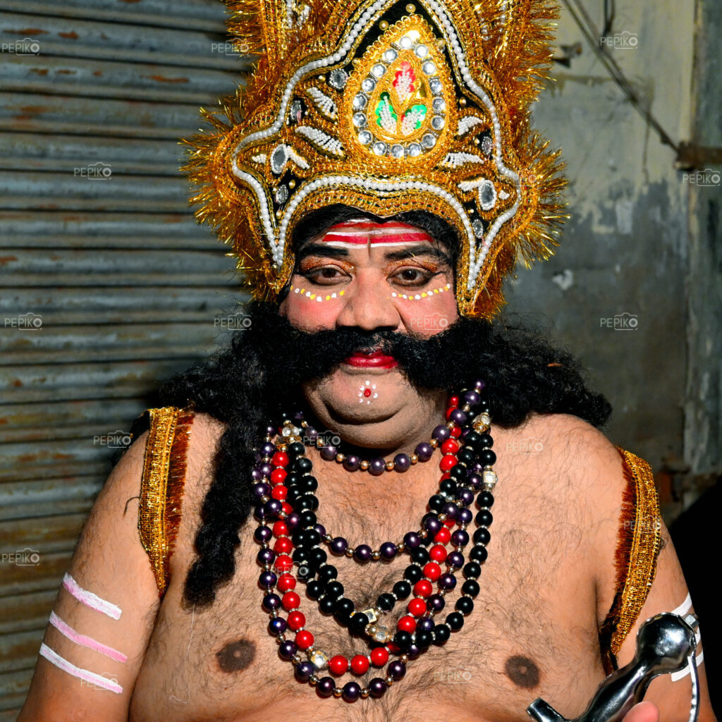 
									Closeup of person in Raavan’s costume