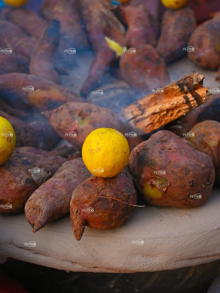 Picture of wood / coal grilled sweet potato with lemon sold at streets