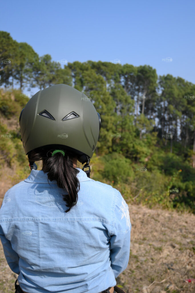 Picture of women with green helmet