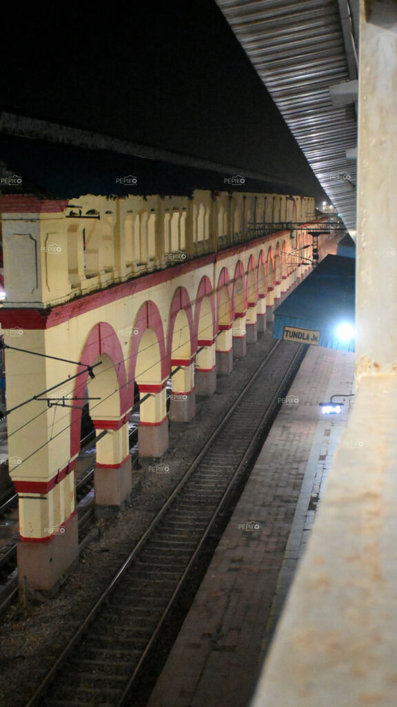 
									Night view of Tundla Railway station tracks / platform in India