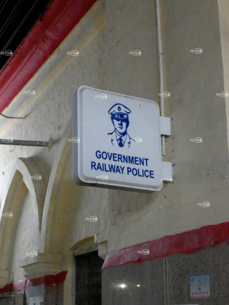 
									Interesting sign board about railway officer at the Indian railway station